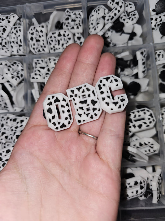 Black and white cow print letter shoe charms