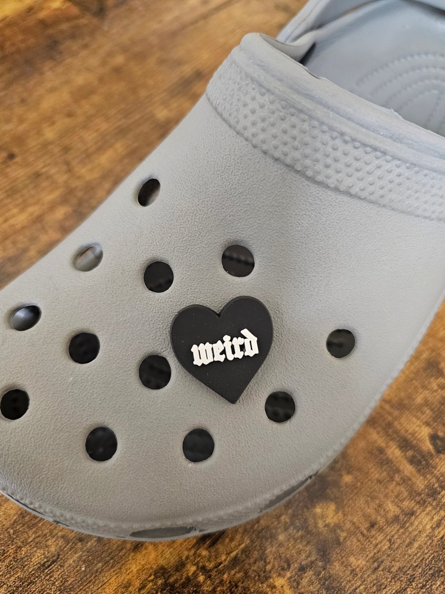 Weird black heart shoe charms