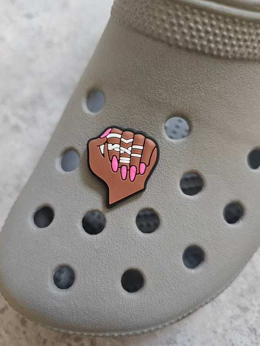 Girly, hand with fingers down pink nails  shoe charm